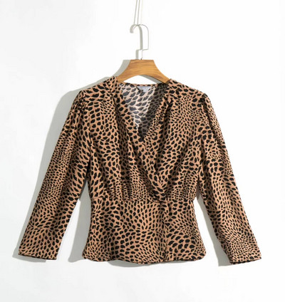 Modern női blúz spitz nyakkivágással és mintával