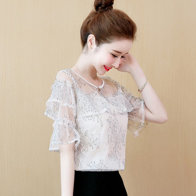 Modern női blúz 3/4-es ujjal és kerek nyakkivágással