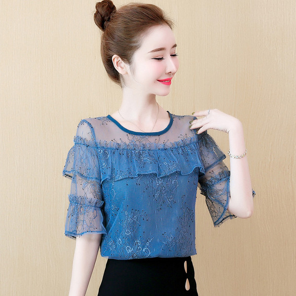 Modern női blúz 3/4-es ujjal és kerek nyakkivágással