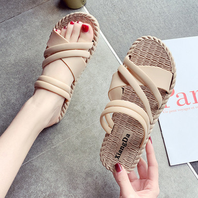Summer women`s sandals with flat soles
