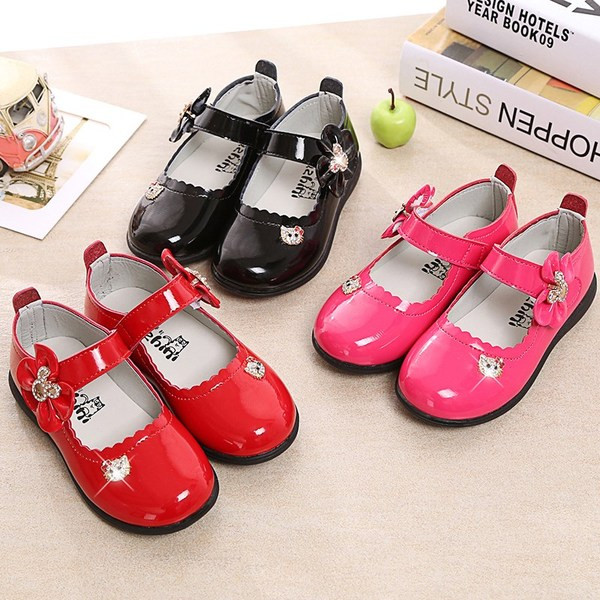 Children`s shoes for girls a wide range of sizes - pink, red and black