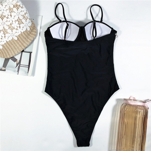 Стилен цял бански костюм с камъни в черен цвят