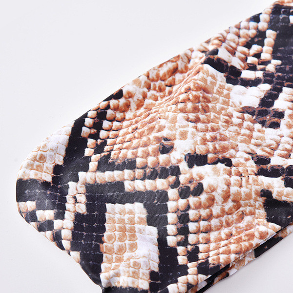 Бански костюм от две части и горнище с змийски десен