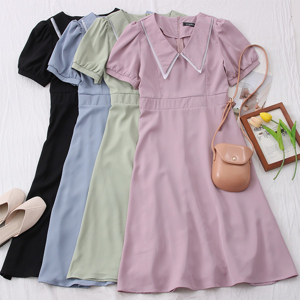 Нов модел ежедневна дамска рокля с къс ръкав - разкроен модел