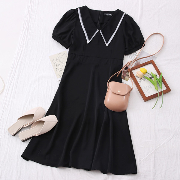 Нов модел ежедневна дамска рокля с къс ръкав - разкроен модел