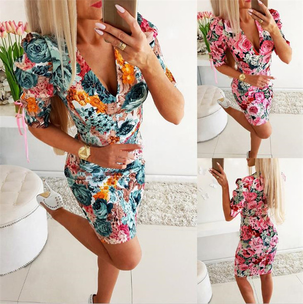 НОВ модел дамска къса рокля с дълбоко деколте,флорален десен и 3/4 ръкав 