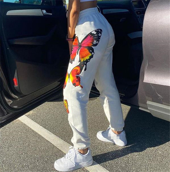 Модерен дамски панталон с ластична талия и цветен десен 