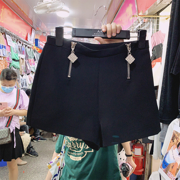 Moderne ženske kratke hlače s patentnim zatvaračem i kamenčićima - visoki struk