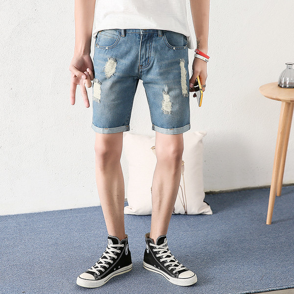 Ежедневни мъжки дънки с разкъсан десен в син цвят