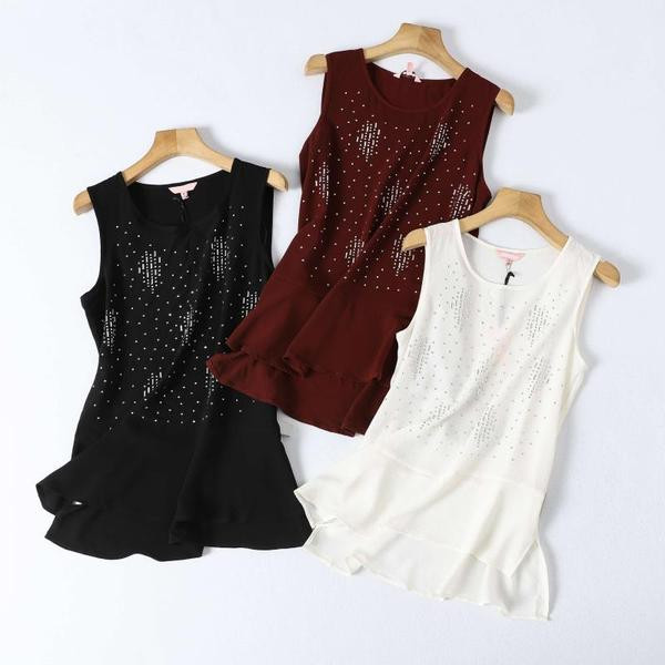 Naiste lokkide ja kaunistuskividega topp