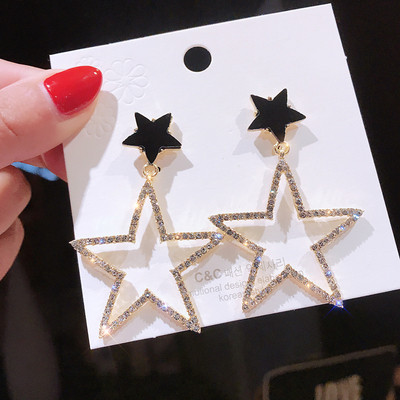 Модерни дамски обеци с камъни във формата на звезда