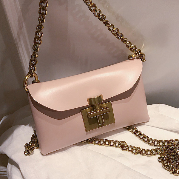 Öko-nahast ja metallist kinnitusega moodne naistekott