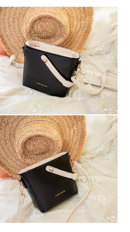 Μικρή καθημερινή γυναικεία τσάντα με δύο λαβές