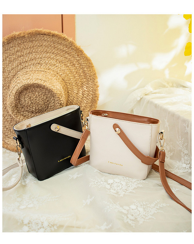 Μικρή καθημερινή γυναικεία τσάντα με δύο λαβές