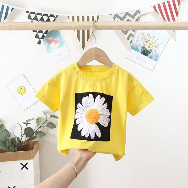 Alkalmi gyerekpóló ovális nyakkivágással és rátéttel