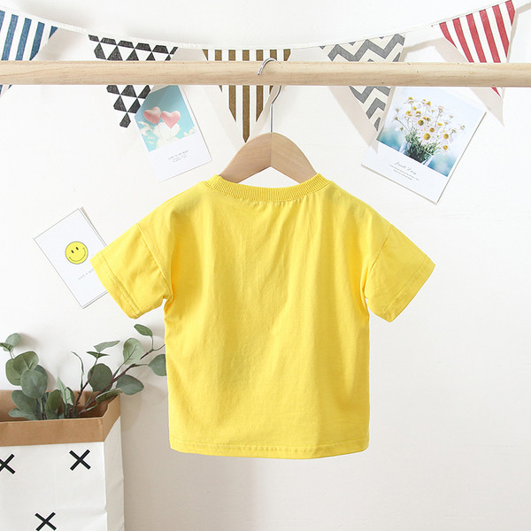 Alkalmi gyerekpóló ovális nyakkivágással és rátéttel