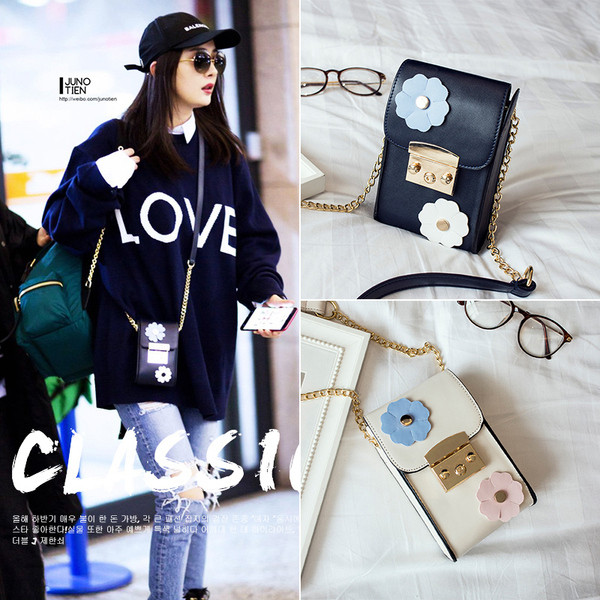 Ženska kožna torba s cvjetićima i metalnom kopčom