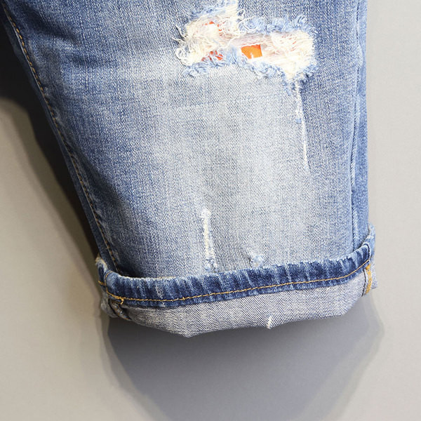 Lezser férfi farmer rövidnadrág szakadt motívumokkal