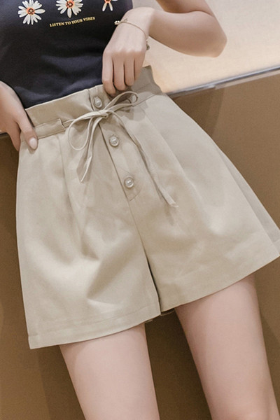 Kõrge vöökoha ja lipsudega vabaaja naiste lühikesed püksid
