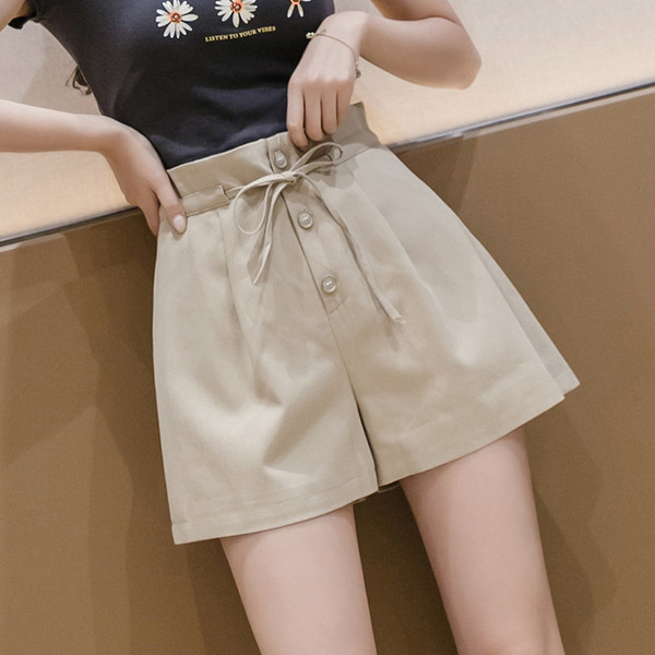 Kõrge vöökoha ja lipsudega vabaaja naiste lühikesed püksid