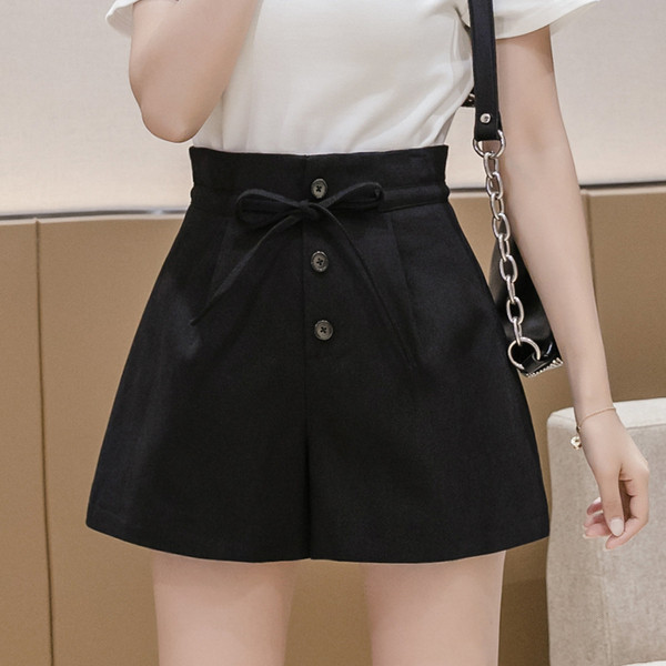 Kõrge vöökoha ja lipsudega vabaaja naiste lühikesed püksid