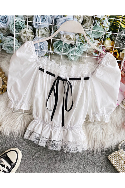 Ženska bluza bijele boje kratkih rukava sa čipkom