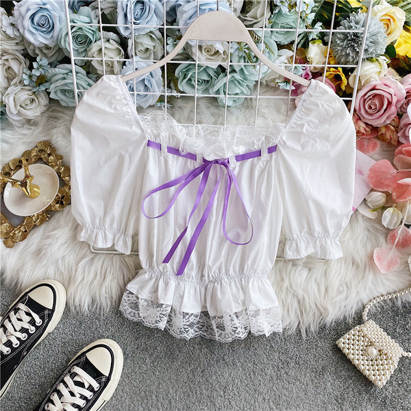 Ženska bluza bijele boje kratkih rukava sa čipkom