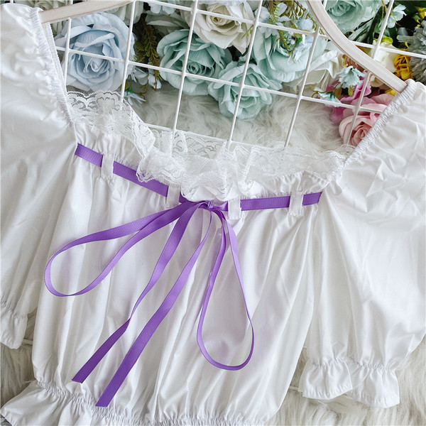 Ženska bluza bijele boje kratkih rukava sa čipkom