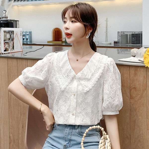 Ležerna ženska košulja sa špic izrezom i vezom