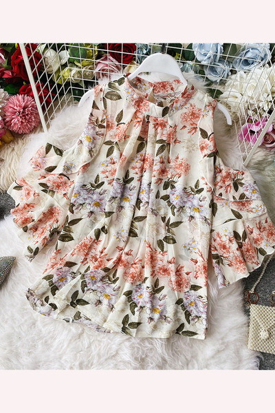 Moderna ženska košulja s cvjetnim uzorkom i golim ramenima te lotos rukavima