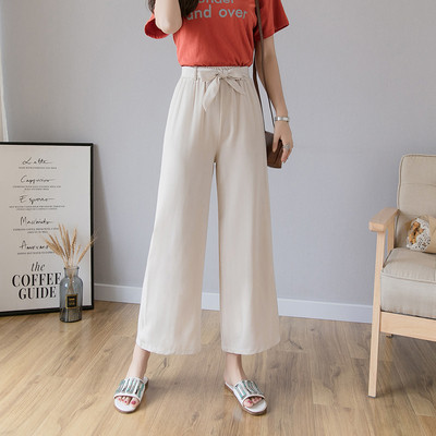 Alkalmi női hosszú nadrág magas derékkal és megkötővel