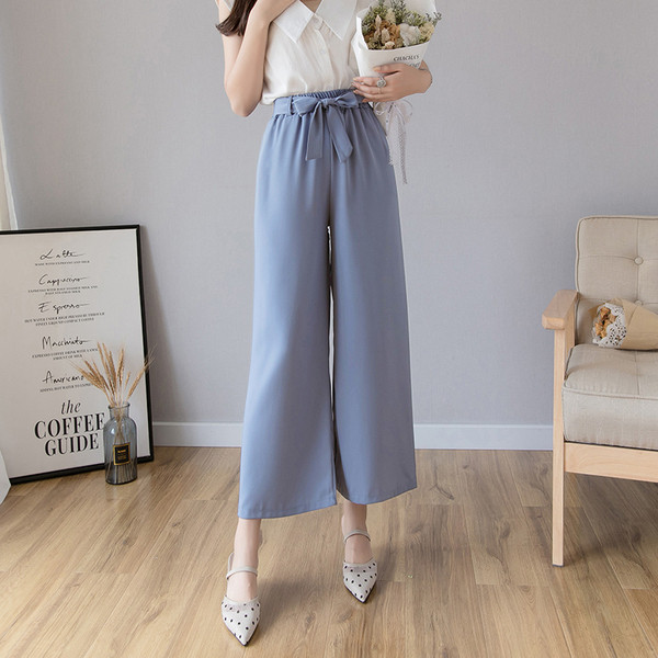 Alkalmi női hosszú nadrág magas derékkal és megkötővel