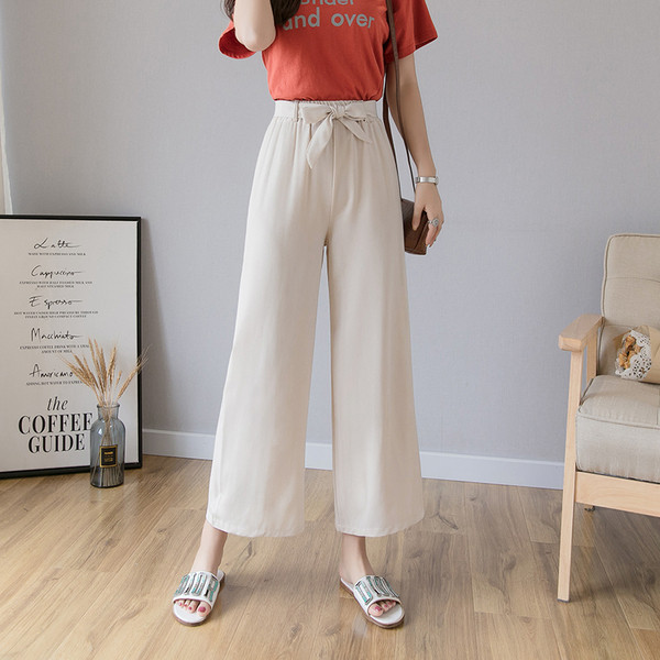 Alkalmi női hosszú nadrág magas derékkal és megkötővel