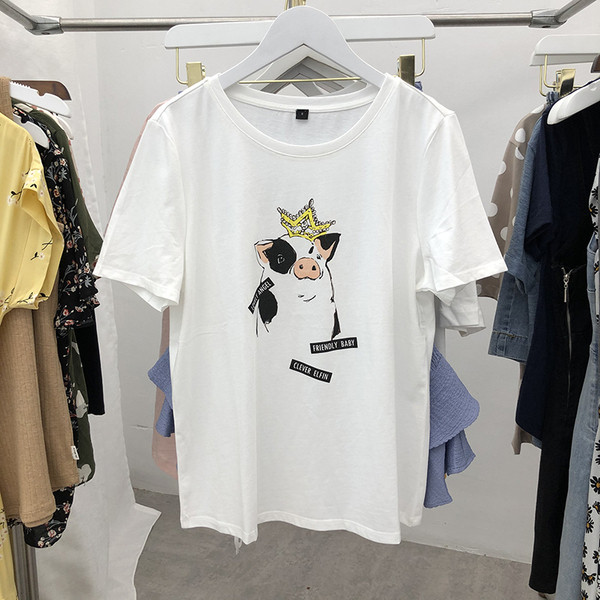 Γυναικείο μπλουζάκι  φαρδύ μοντέλο σε λευκό χρώμα με απλικέ