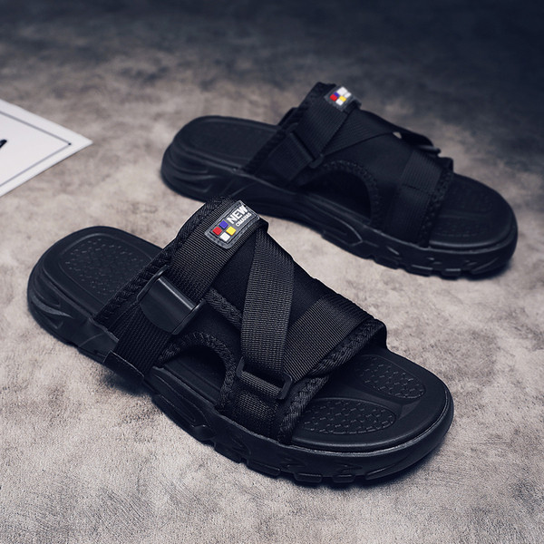 Musta värvi lameda tallaga vabaaja meeste sussid