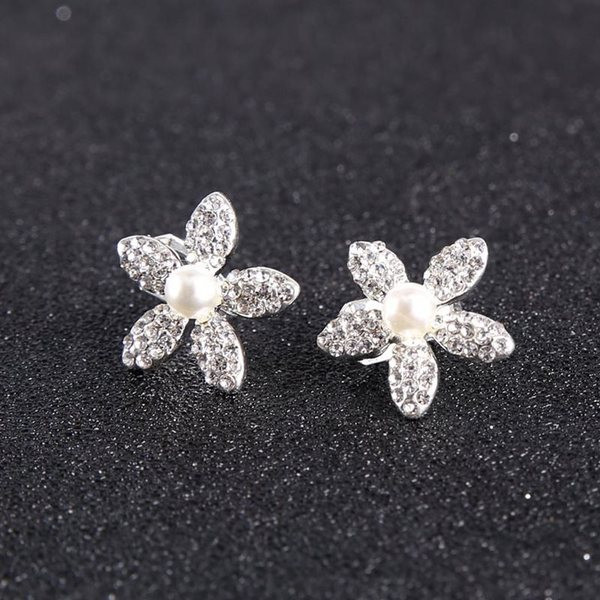 Сребристи обеци с камъни и перли