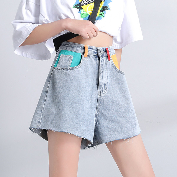 Női rövid farmer új modell világos színben, színes zsebekkel