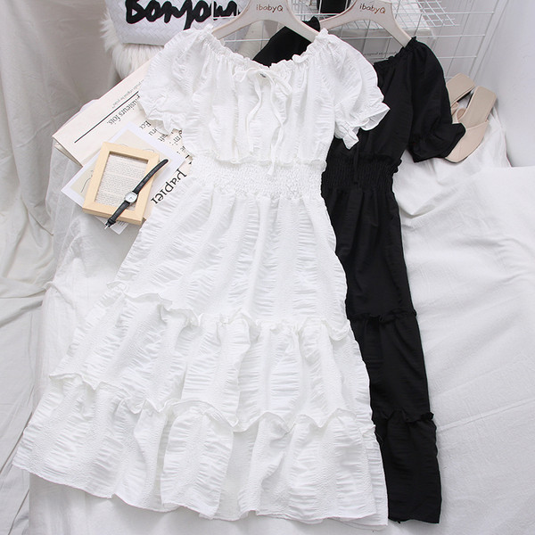 Modern női ruha csónakos nyakkivágással - szabású modell