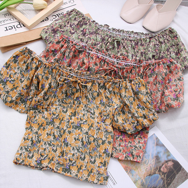 Új modell női blúz csónakos nyakkivágással és virágmintával