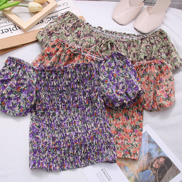 Új modell női blúz csónakos nyakkivágással és virágmintával