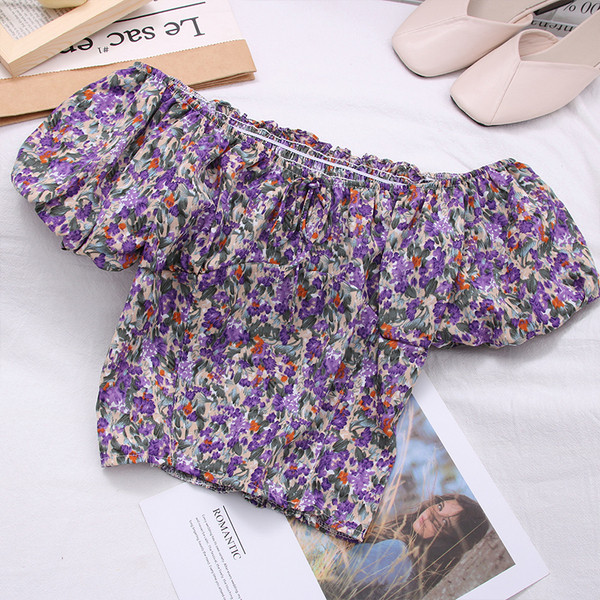 Új modell női blúz csónakos nyakkivágással és virágmintával