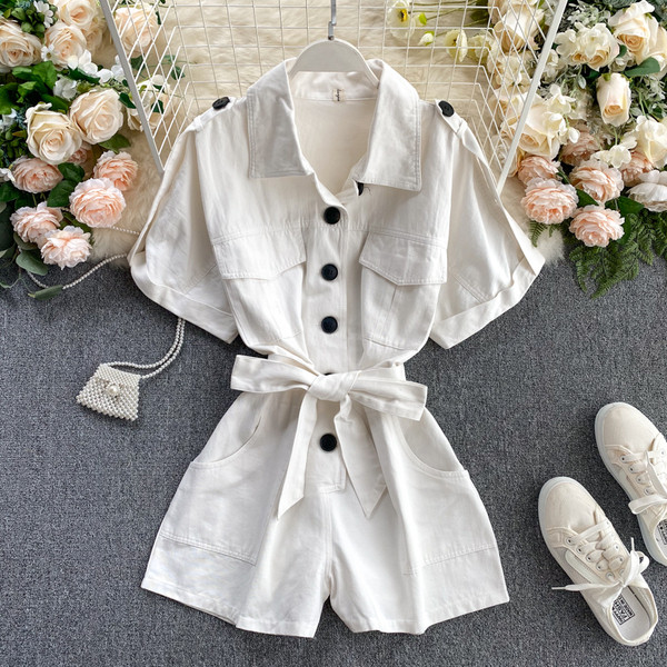 Női alkalmi kombiné rövid ujjal és zsebekkel