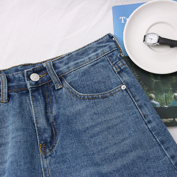 Farmer rövidnadrág szakadt motívumokkal, magas derékkal