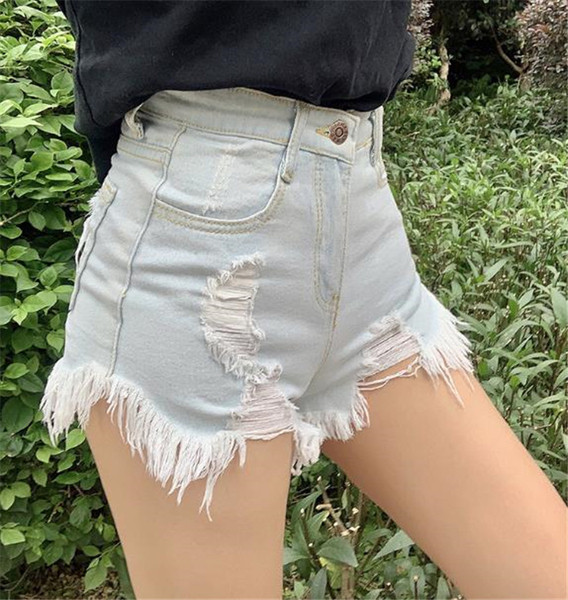 Rövid, lezser női farmer magas derékkal, jobbra szakadt