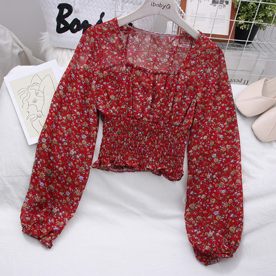 Moderna ženska bluza sa širokim rukavima i cvjetnim motivima