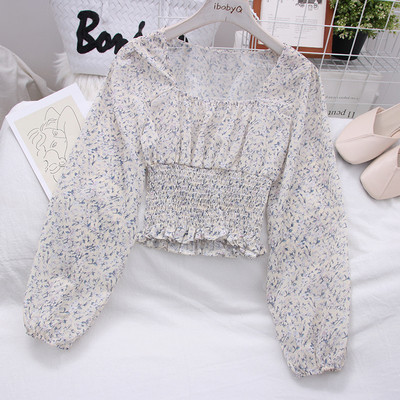 Moderna ženska bluza sa širokim rukavima i cvjetnim motivima