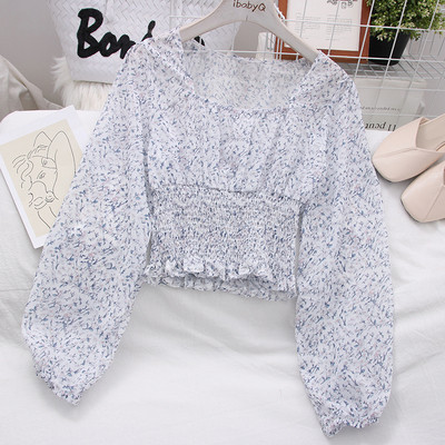 Moderna ženska bluza sa širokim rukavima i cvjetnim motivima