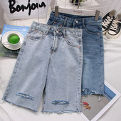 Pantaloni de dama din denim 3/4 cu talie inalta si motive rupte