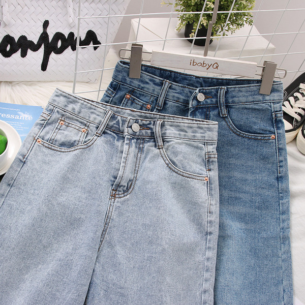 Női farmer 3/4-es nadrág magas derékkal, szakadt motívumokkal