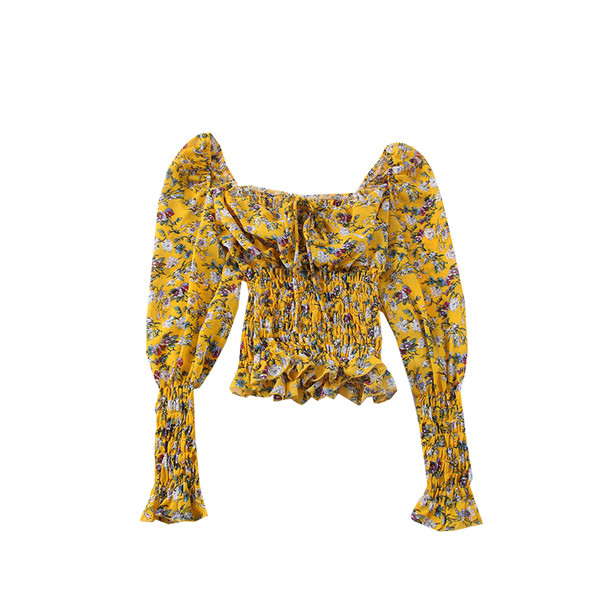 Női blúz csónakos nyakkivágással és virágmintával